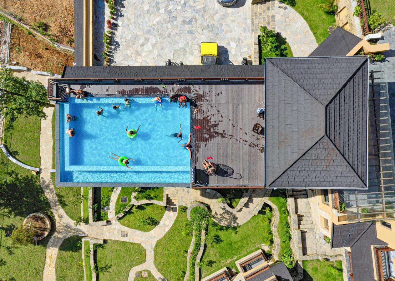Bar Peepal Resort Pokhara Kültér fotó Aerial view of the pool