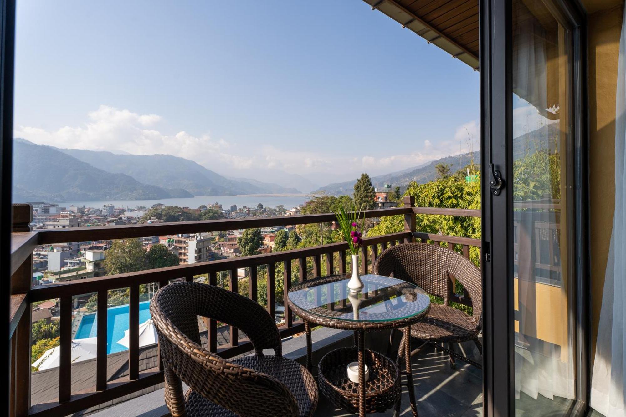 Bar Peepal Resort Pokhara Kültér fotó A view of Lake Biwa from a guest room