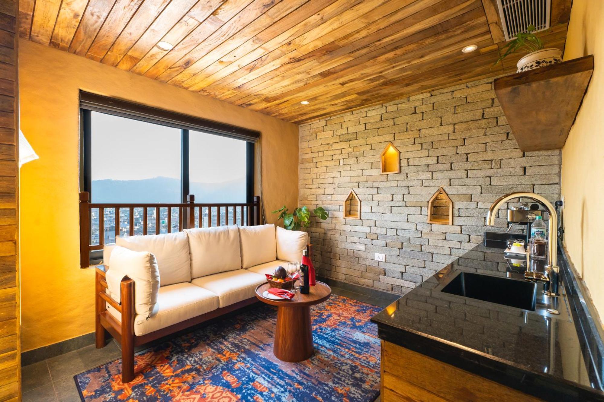 Bar Peepal Resort Pokhara Kültér fotó A living room in a typical apartment